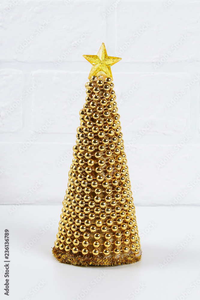 Diy golden Christmas tree from beads garland. Guide on the photo how to make a decorative Christmas tree from cardboard, stars, hot glue and beads with your own hands. Handmade Christmas decor. Diy golden Christmas tree from beads garland. Guide on the photo how to make a decorative Christmas tree from cardboard, stars, hot glue and beads with your own hands. Handmade Christmas decor.