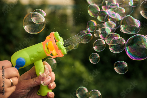 Image of toy gun shooting bubbles