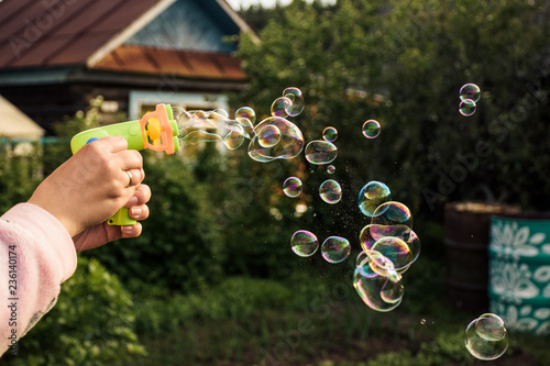 Image of toy gun shooting bubbles