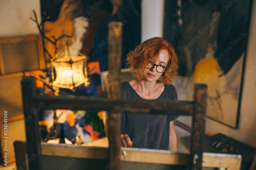 woman painter in her art studio painting woman painter in her art studio painting