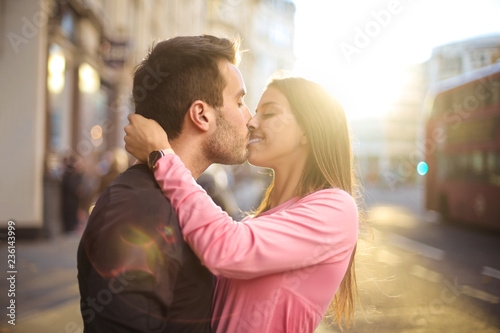 Sticker Lovely couple kissing in the street