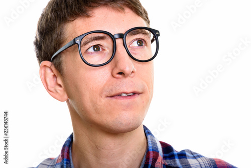 Close up of man thinking while wearing eyeglasses 