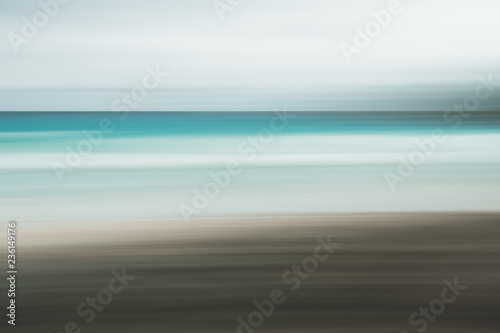 Empty sea and beach background with copy space, Long exposure, blur motion blue abstract vintage tinted gradient background