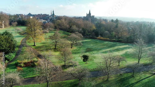 Low level aerial image of Pittencrieff Park in Dunfermline on an early winter’s day with hazy sunlight.