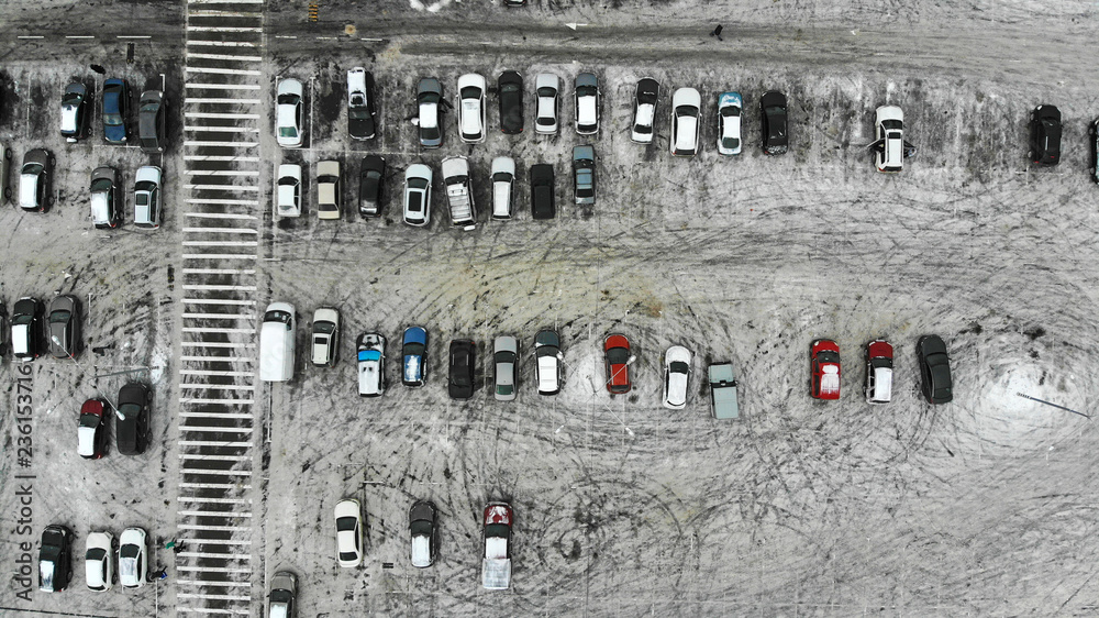 Aerial. Parking lot near the pedestrian crossing. Winter season.