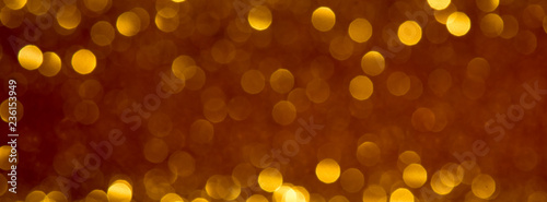 Gold glitter lights texture bokeh background Christmas
