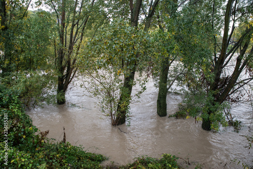 Flood  a river overflows after aboundant rain