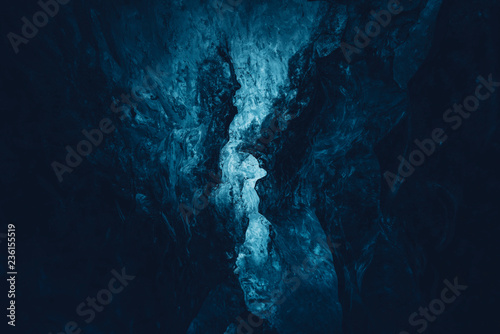 View of blue crystal ice in cave photo
