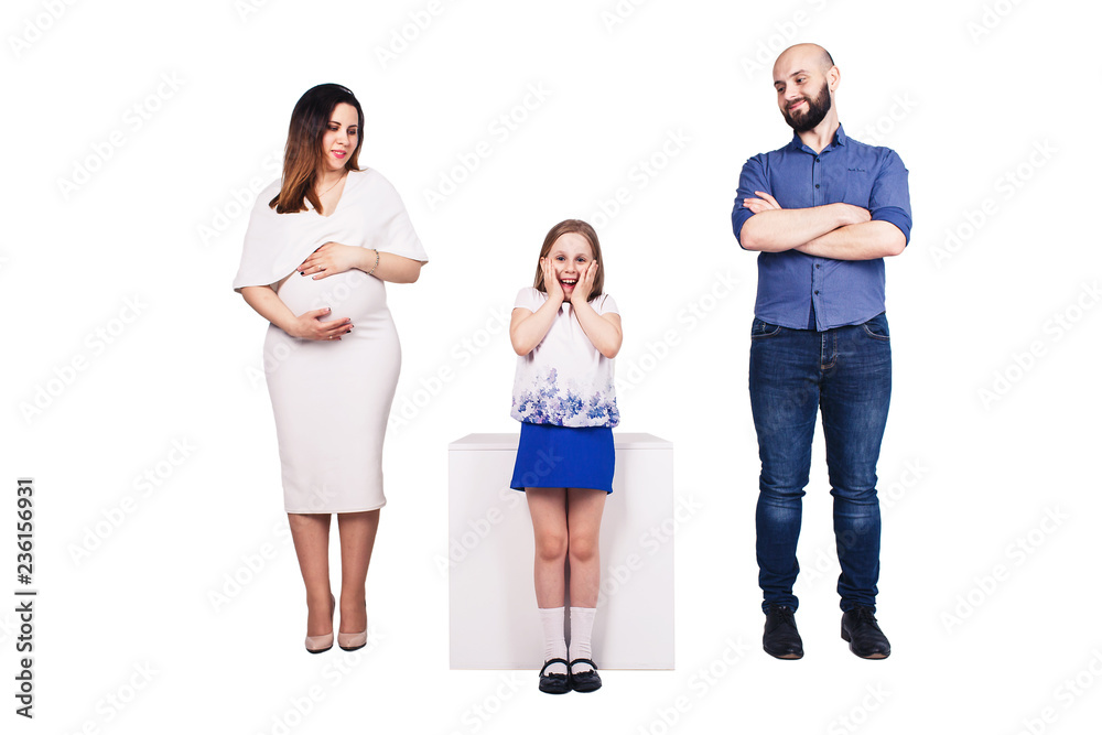 happy young family isolated over white background. Bearded father, pregnant mother and happy daughter. happy young family isolated over white background. Bearded father, pregnant mother and happy daughter.