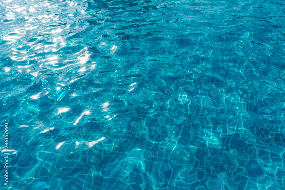 Surface of swimming pool water background Surface of swimming pool water background
