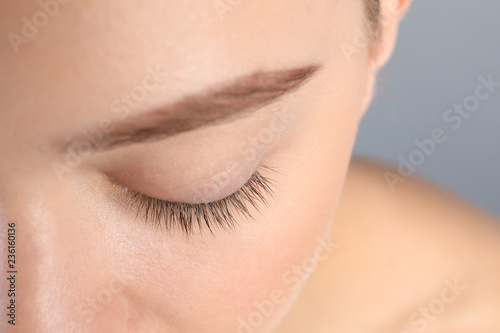 Young woman with beautiful natural eyelashes, closeup