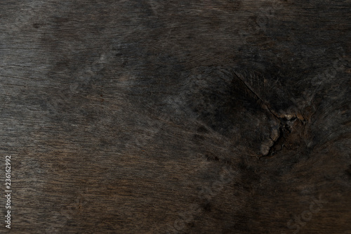 Oak wooden board with dark brown. Almond Tree Wood Grained Texture. Dark Wooden Background.