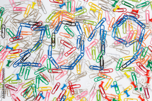 A colorful paper clips with 2019 numbers and new year or christmas theme on a white background  top view.