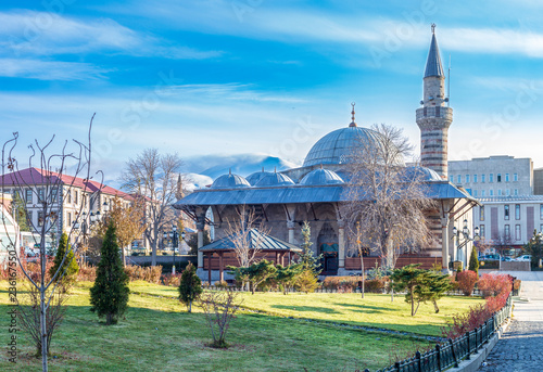Lalapasa mosque with palandoken mountain background with snow in Erzurum, Turkey photo