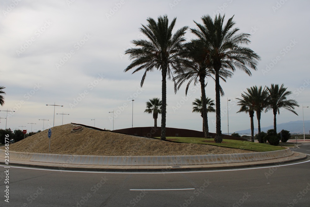 Roundabout with grass and sand