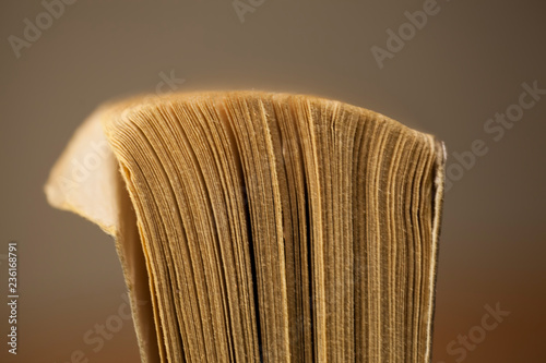 old book on wooden table photo