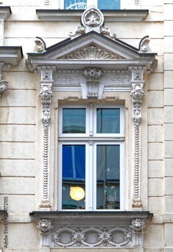 Germany Thuringen, decorated window of vintage building, lights on inside