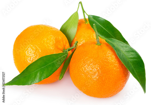 Fresh mandarine with leaf on white background