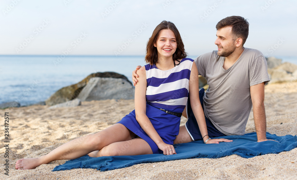 Fototapeta premium Happy loving couple resting and hugging