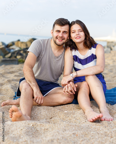 Young loving couple sitting and hugging © JackF