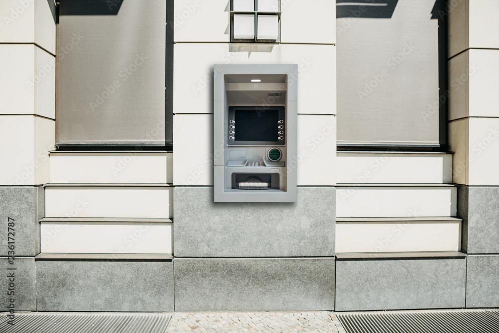 Modern street ATM machine for withdrawal of money and other financial transactions. Modern street ATM machine for withdrawal of money and other financial transactions.