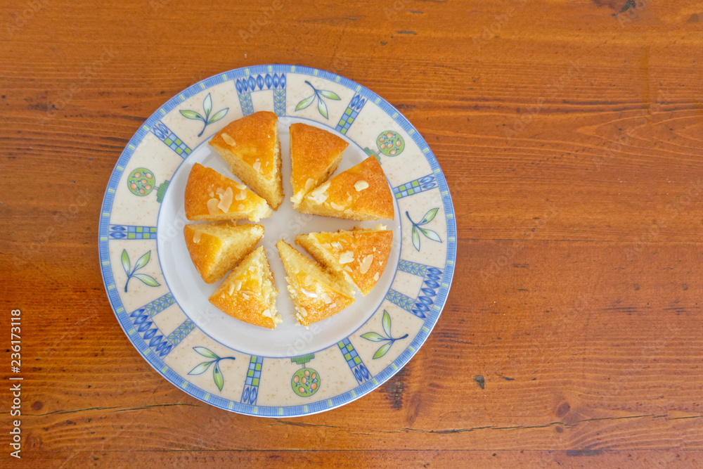 small homemade cake sliced and served small homemade cake sliced and served