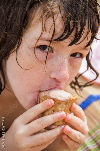 little girl eat ice-cream