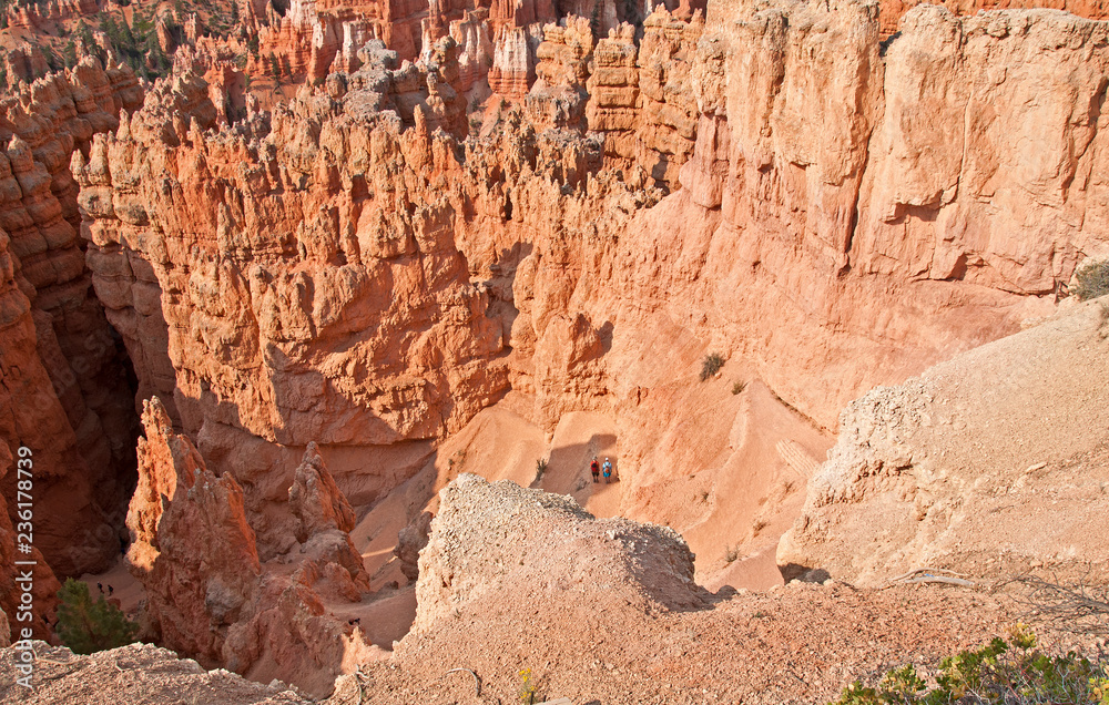 Bryce Canyon, USA, view from lookout point, with hikers in the valley Bryce Canyon, USA, view from lookout point, with hikers in the valley
