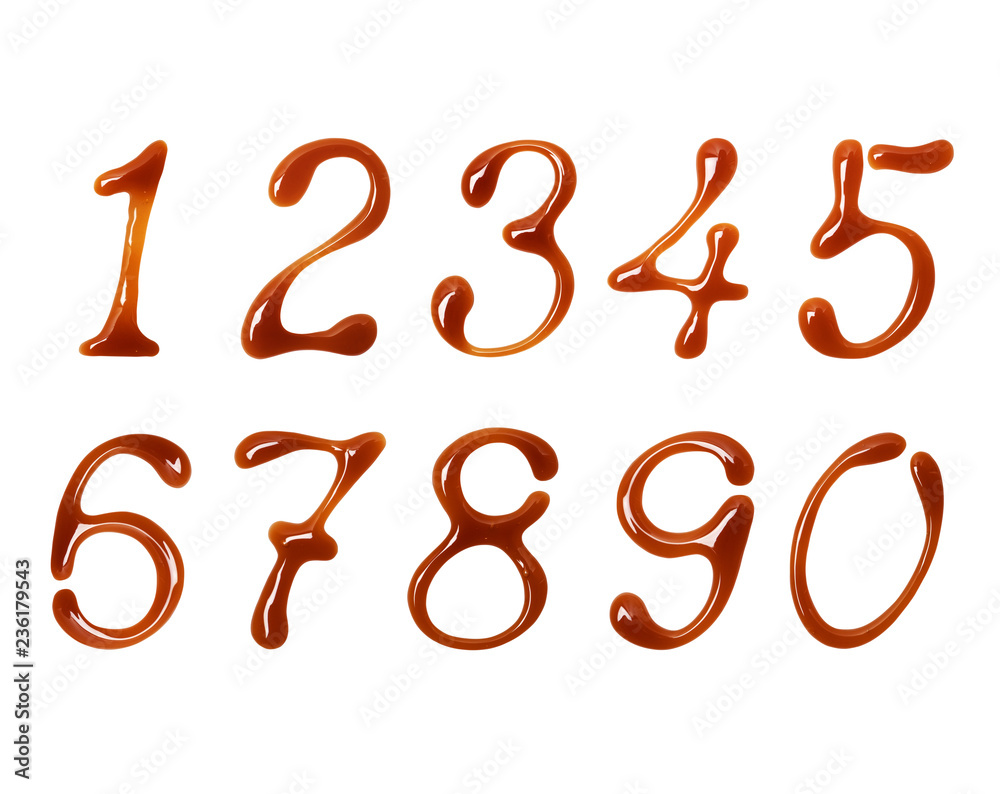 Delicate numbers made of caramel isolated on white background Delicate numbers made of caramel isolated on white background