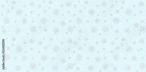 Christmas pattern with snowflakes on light blue, marble texture, scratched background.
