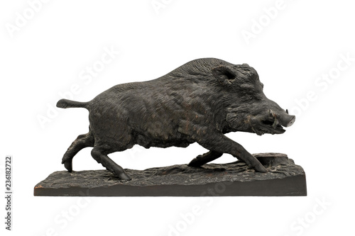 A figure of a wild boar from bronze, on a white background. Isolated.