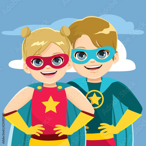 Cute super little hero siblings brother and sister in superhero suits