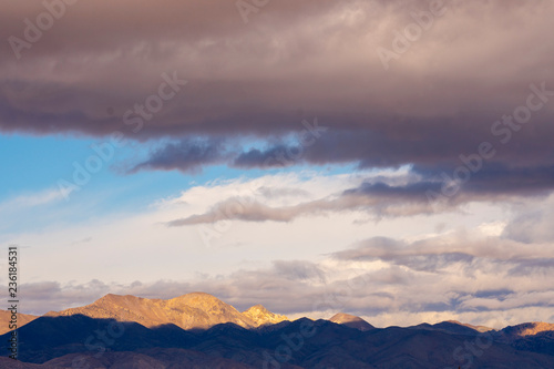 storm clouds over desert mountains