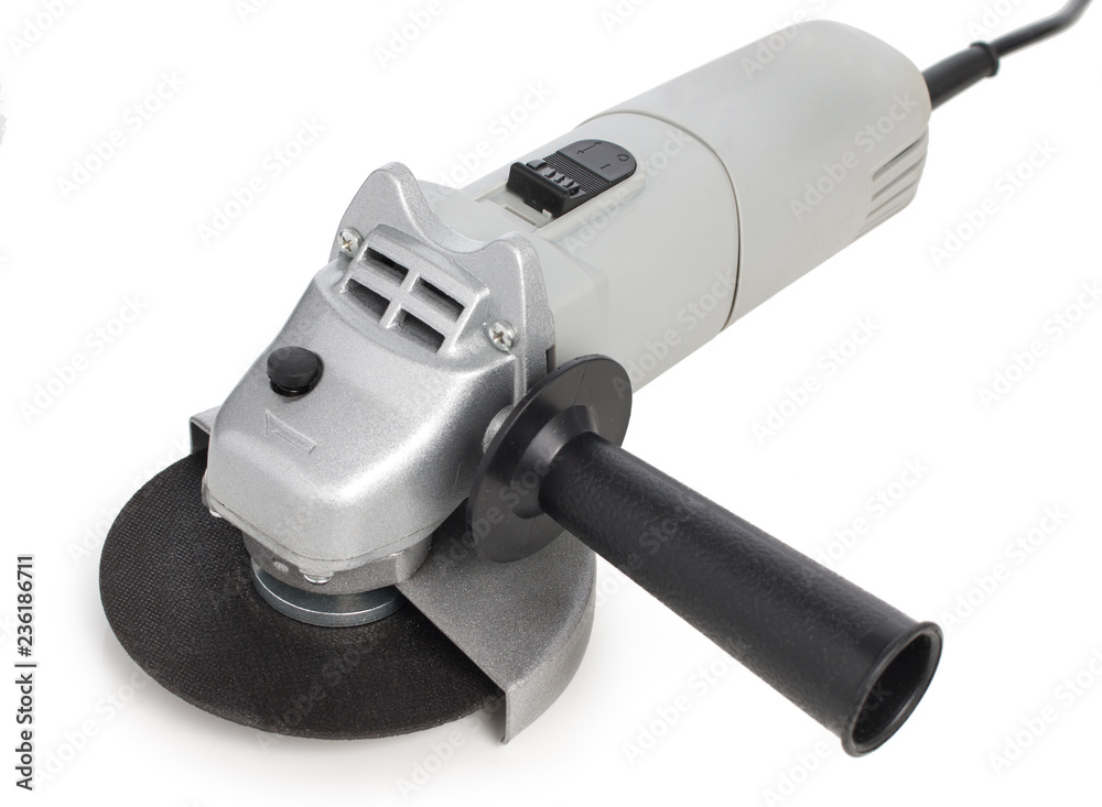 Angle sander machine tool with abrasive disc isolated on white background. Angle sander machine tool with abrasive disc isolated on white background.