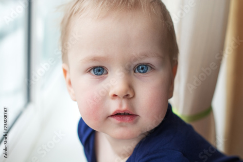 portrait insightful look blue eyes boy two years old