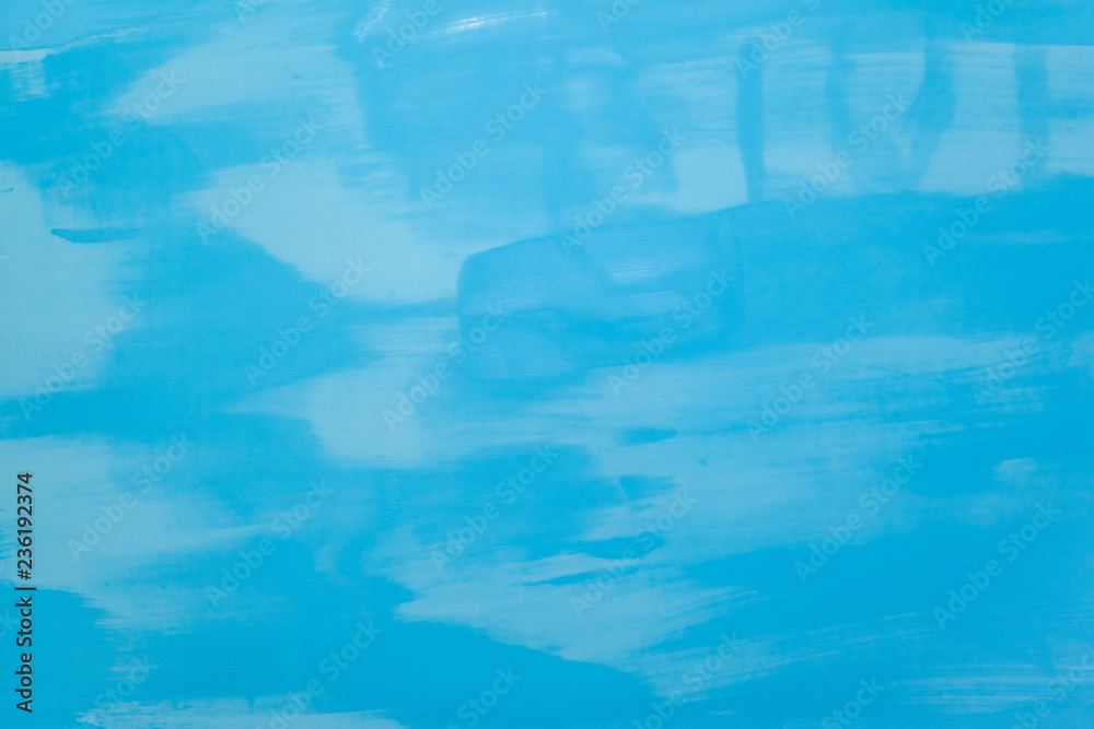 bright blue surface with paint strokes, background, texture