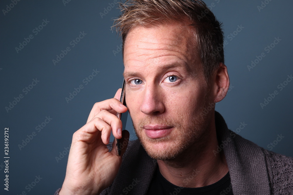 Portrait of a man in front of a colored background Portrait of a man in front of a colored background