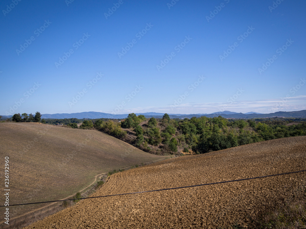Agriculture landscape of the tuscany seen from white roads in october chianti italy Agriculture landscape of the tuscany seen from white roads in october chianti italy