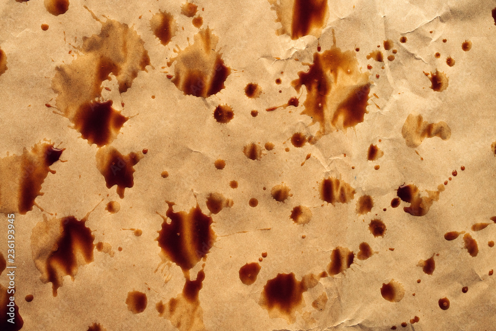 Coffee drips, stains and splashes on brown paper Coffee drips, stains and splashes on brown paper