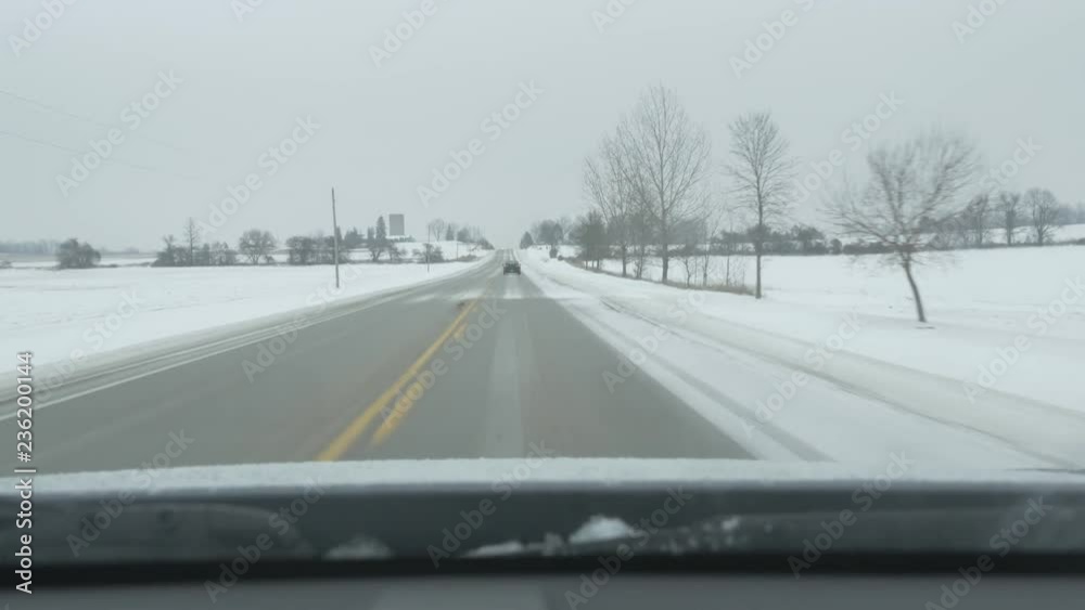 Driving on Simcoe County Rd 88. Approaching 20th Side Rd in Bond Head, Ontario, Canada. Winter driving in rural Ontario, Canada. Driving on Simcoe County Rd 88. Approaching 20th Side Rd in Bond Head, Ontario, Canada. Winter driving in rural Ontario, Canada.
