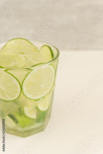 Glass of traditional brazilian drink, caipirinha with lemon photo