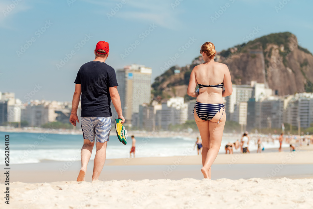 Couple Of Middle Aged People Walking On Copacabana Beach Rio De Janeiro Brazil Stock Photo Adobe Stock