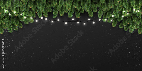 Christmas and New Year background with fir branches, lights, Xmas decorations glowing white garlands. Christmas theme. Vector Illustration