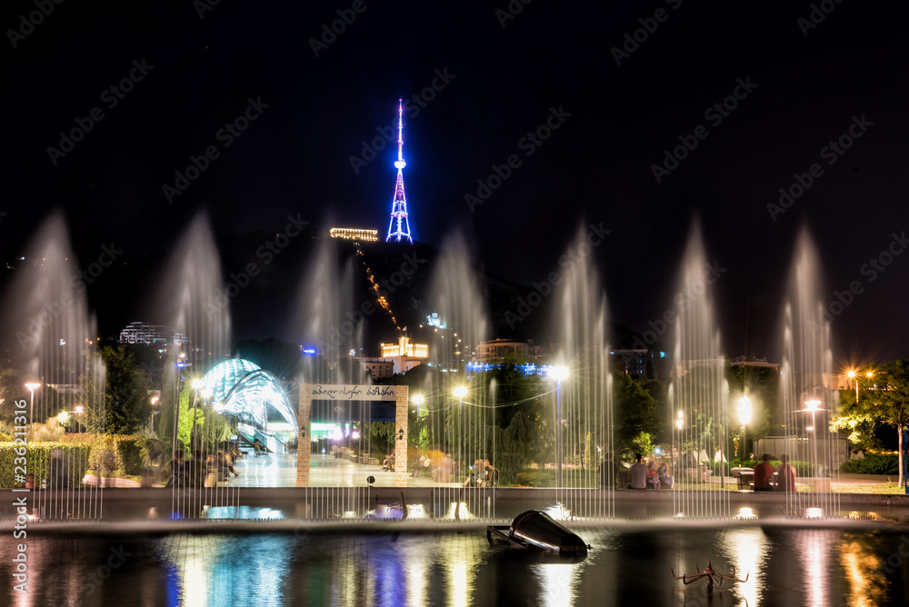 Georgia, Tbilisi - July, 3, 2018. Fountain at Rike square Tbilisi at night