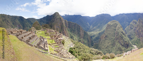 Mountains and valleys continue to protect the UNESCO world heritage listed citadel of Machu Picchu, Peru.