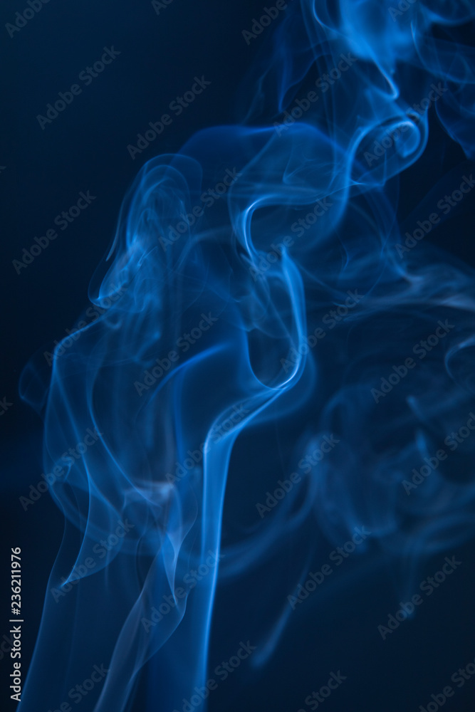 Abstract blue smoke swirls