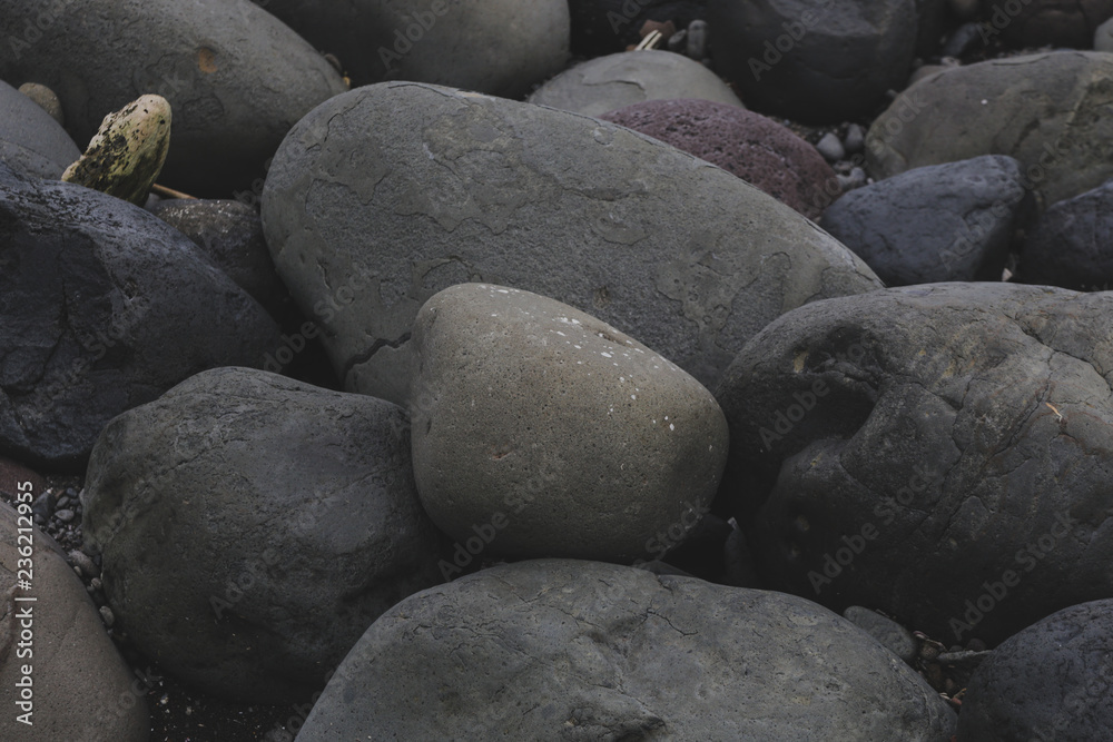 Big smooth black beach stones background Big smooth black beach stones background