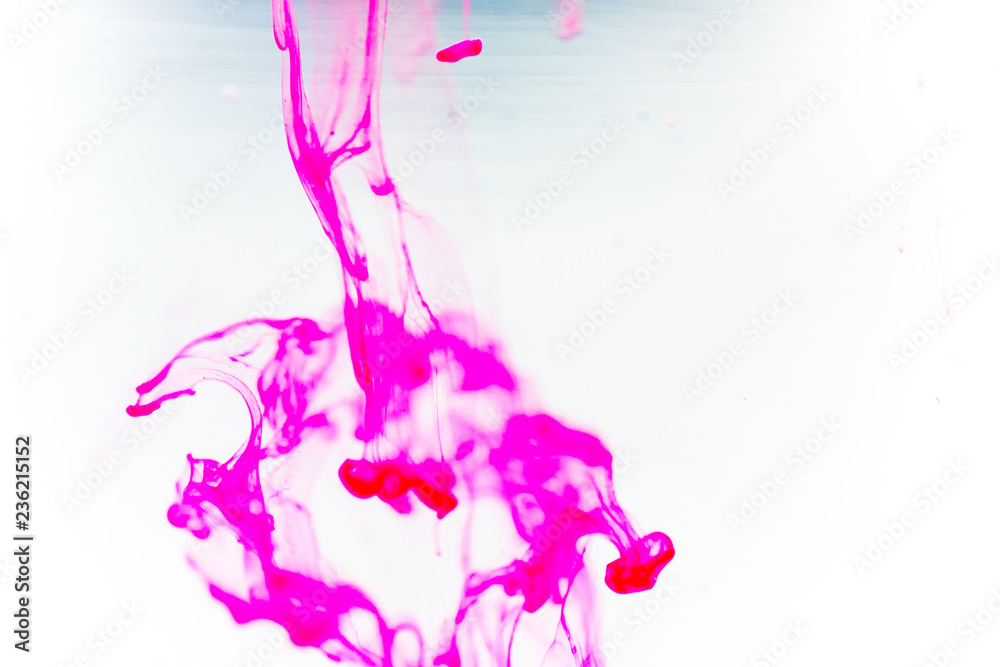 Obraz premium a drop of paint pouring in water