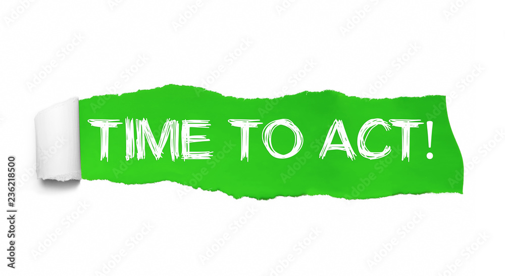 Torn green paper revealing the words TIME TO ACT Torn green paper revealing the words TIME TO ACT