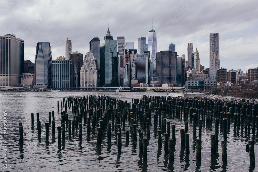 View of the Manhattan skyline from Brooklyn Heights, New York. Cloudy spring day